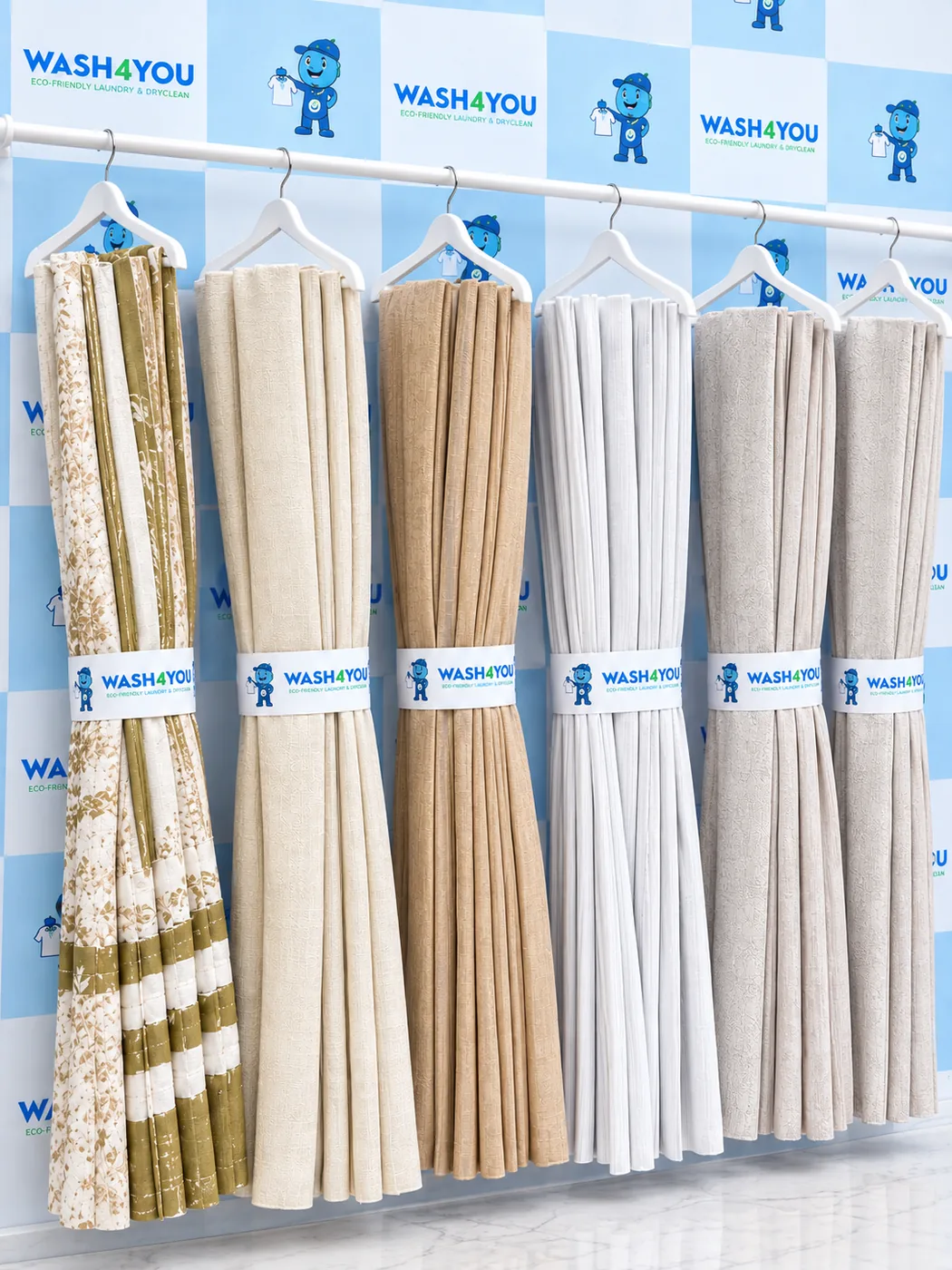 Curtains packed on hangers by Wash4You