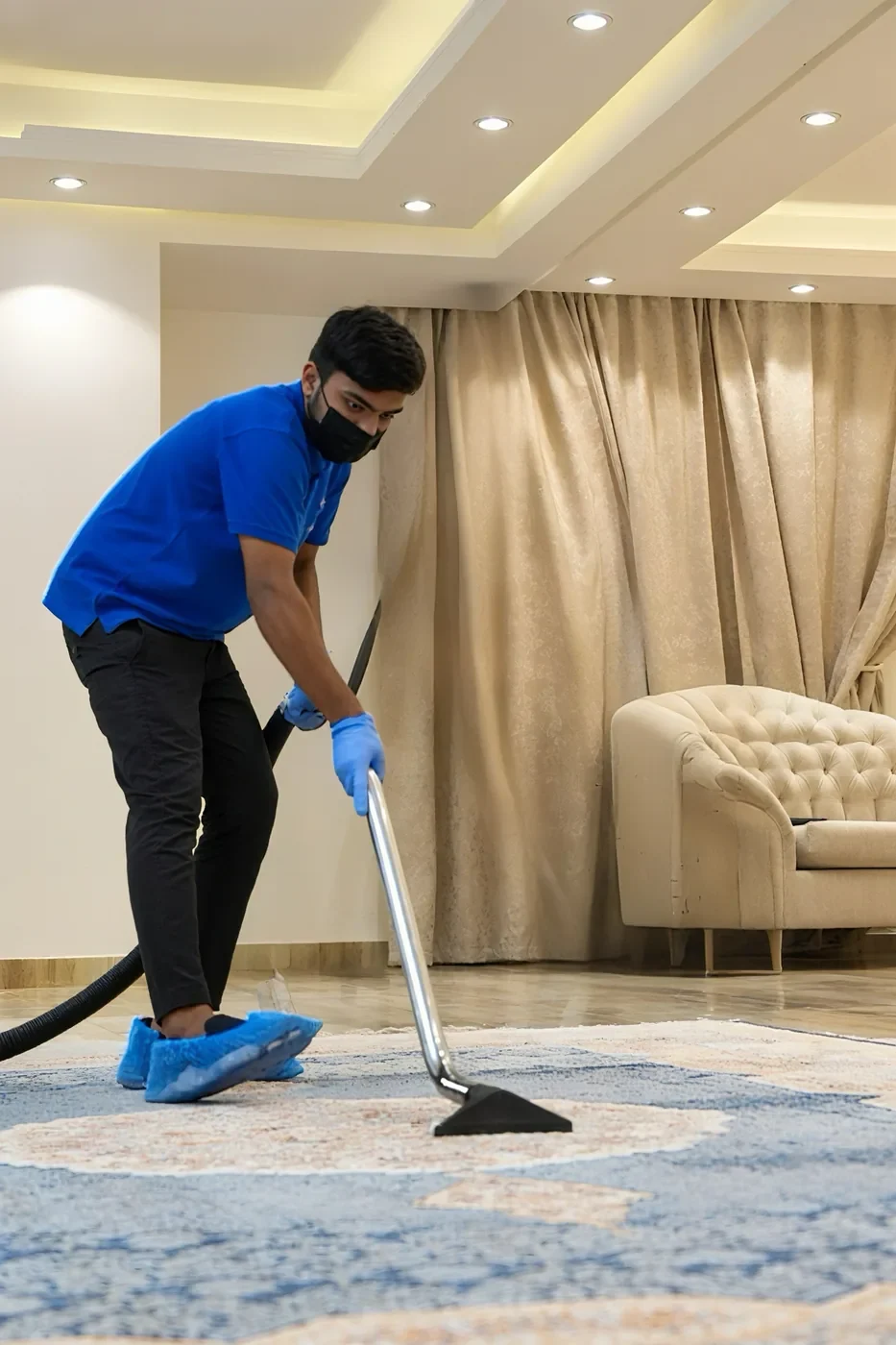 Wash4You team member deep cleaning a carpet at home