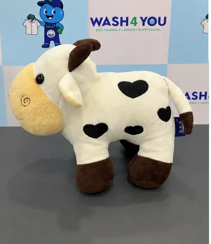 The same soft toy cow after Wash4You cleaning
